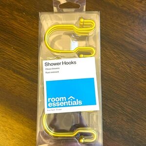 Shower curtain hooks in brass finish. New